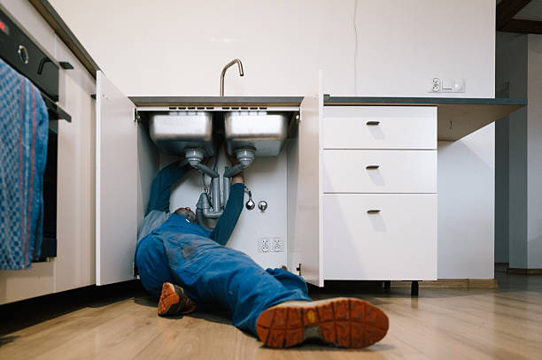 Professional Emergency Plumber technician working in Rockville, IN